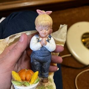 Charming Figurine with Blue Overalls